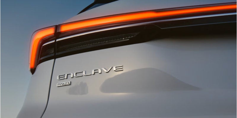 2026 Buick Enclave emblem close-up in Quincy IL highlighting luxury SUV branding