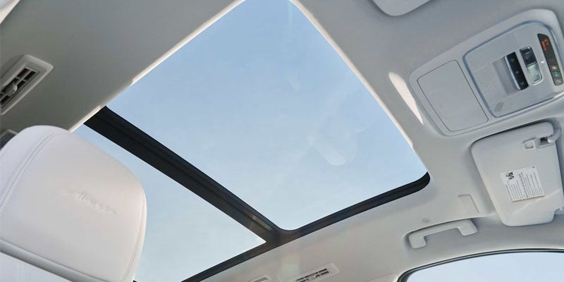 2026 Buick Enclave technology interior in Quincy IL with 30-inch ultrawide display, wireless Apple CarPlay, Android Auto, and Super Cruise