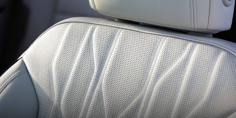 2026 Buick Enclave front seat detail in Quincy IL showing quilted leather-appointed seating and heated and ventilated features