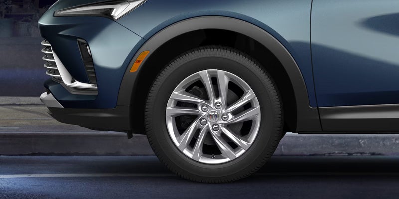 2026 Buick Envista wheel rim detail in Quincy IL highlighting 18 to 19 inch aluminum wheel designs with Sport Touring styling accents