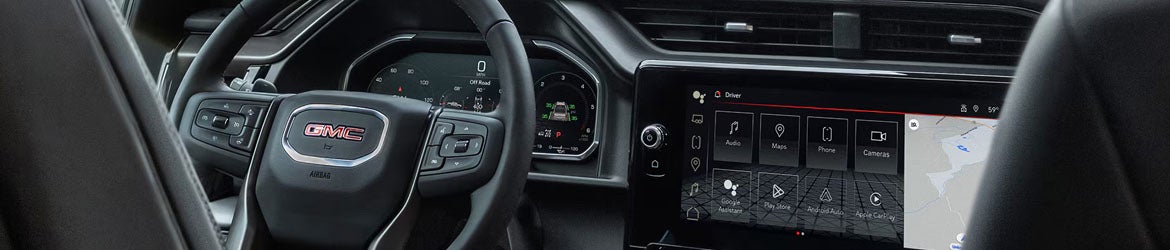 2026 GMC Sierra 1500 infotainment system in Quincy, IL featuring a 13.4-inch touchscreen, Google built-in integration, Apple CarPlay®, and Android Auto® for seamless connectivity and navigation.
