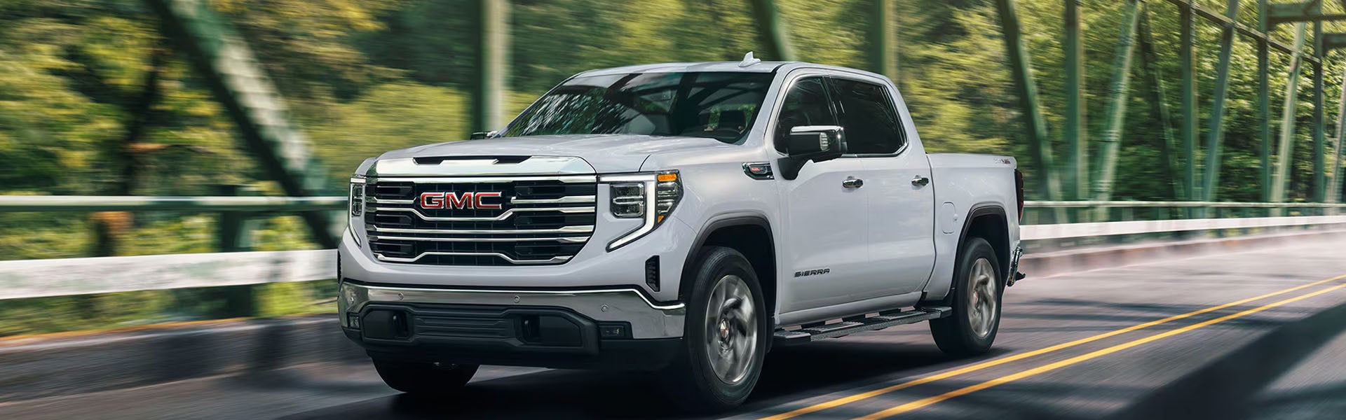 2026 GMC Sierra 1500 infotainment system in Quincy, IL featuring a 13.4-inch touchscreen, Google built-in integration, Apple CarPlay®, and Android Auto® for seamless connectivity and navigation.