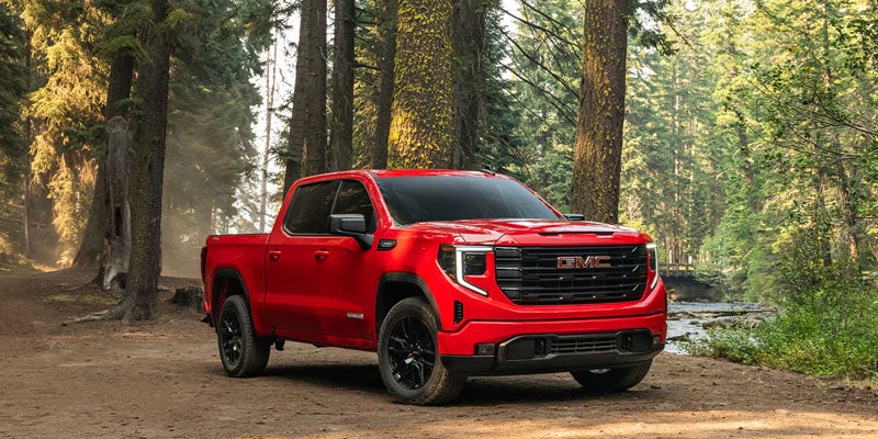 2026 GMC Sierra 1500 trim levels in Quincy, IL including Pro, SLE, Elevation, SLT, AT4, AT4X, Denali, and Denali Ultimate with premium truck features.