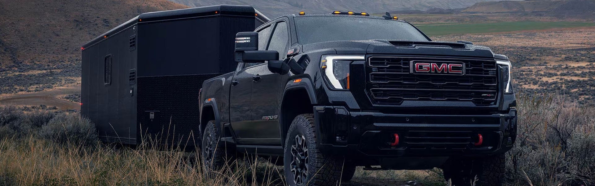 2026 GMC Sierra 2500 HD infotainment in Quincy IL showing 13.4-inch touchscreen, navigation, Apple CarPlay, Android Auto, and trailering information