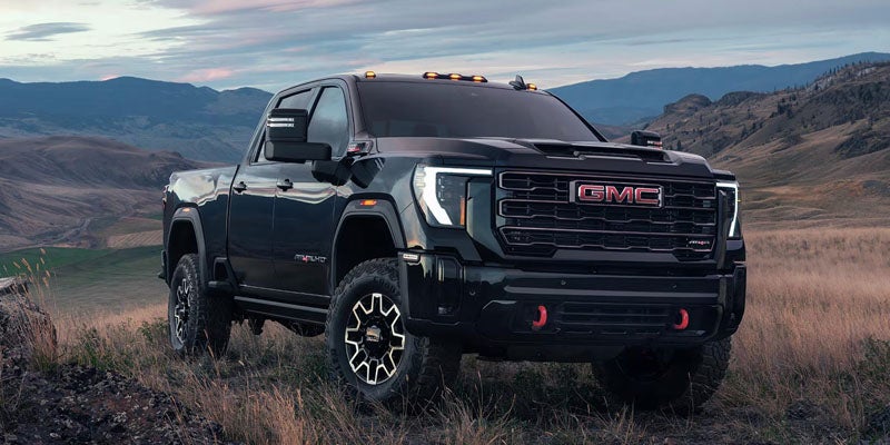 2026 GMC Sierra 2500 HD trim levels in Quincy IL including Pro, SLE, SLT, AT4, AT4X, Denali, and Denali Ultimate