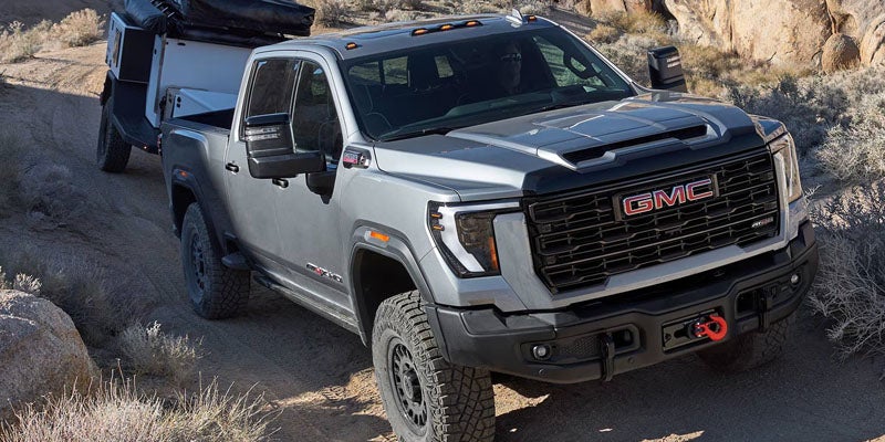 2026 GMC Sierra 2500 HD off-road towing in Quincy IL using ProGrade Trailering System with stability and control