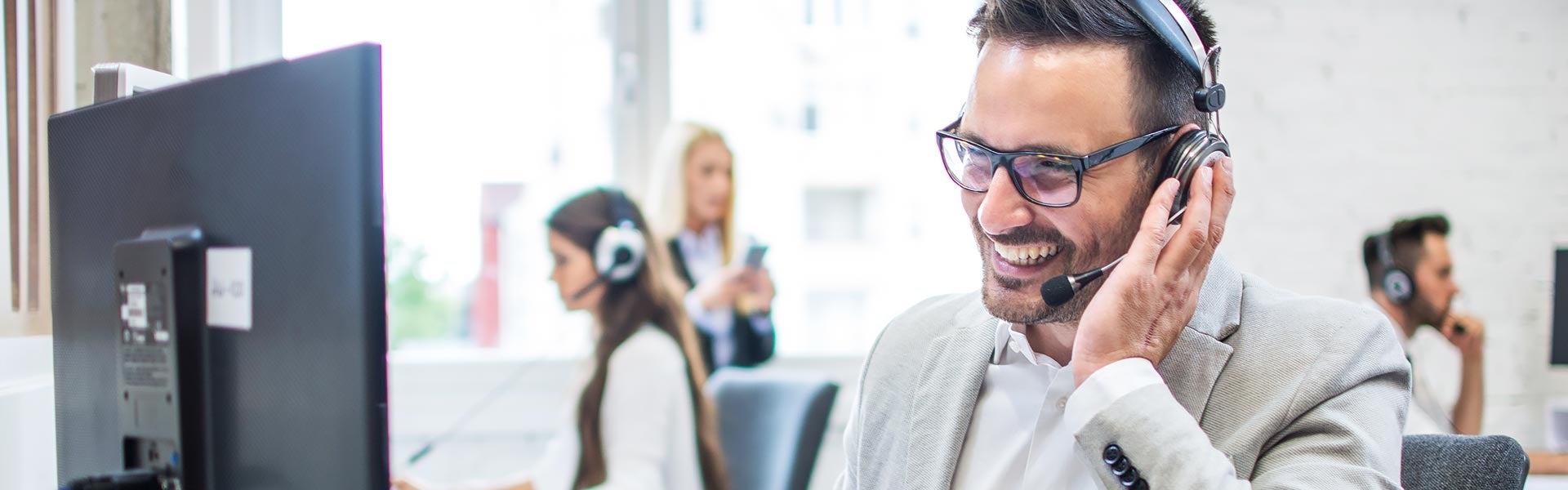 People talking on headsets